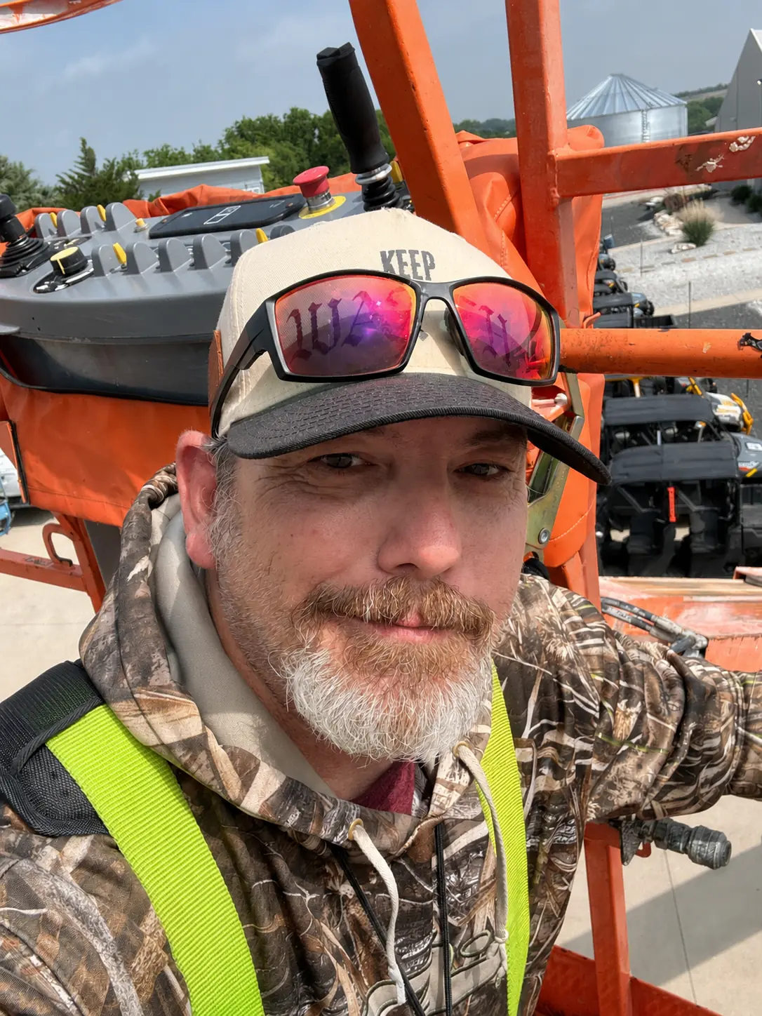 Steve Smith on an aerial lift during an outdoor wireless installation